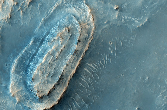 Ancient exposed bedrock and a diverse collection of hydratated minerals got this site a spot on the Mars 2020 candidate landing list. The targeted zone is located in the northeast part of Syrtis Major, a huge shield volcano and near the northwest rim of the giant impact basin Isidis Planitia.