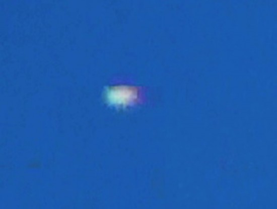 September 21, 2012. Still removed from video footage of a UFO buzzing a chemtrail jet.